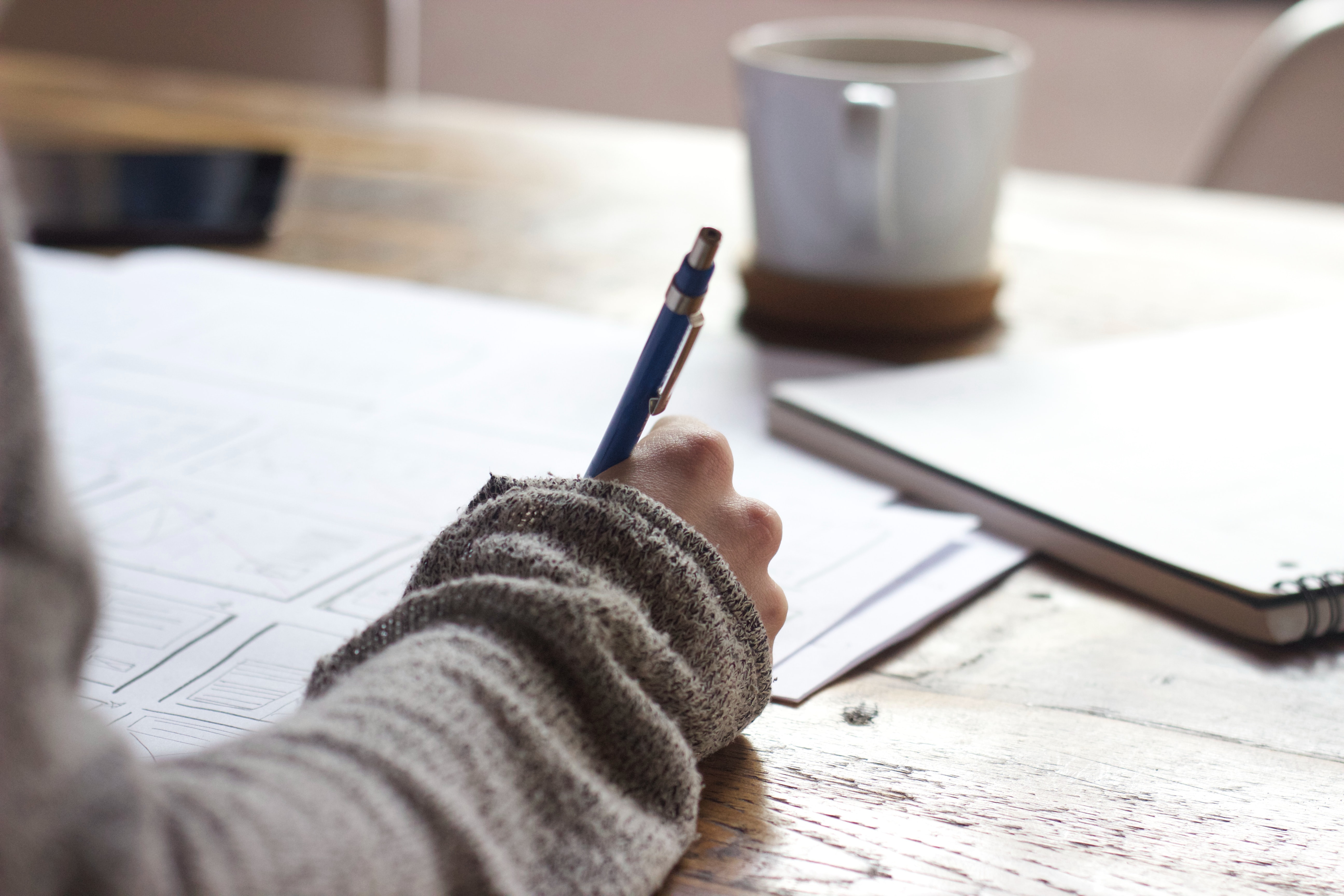 A person is writing