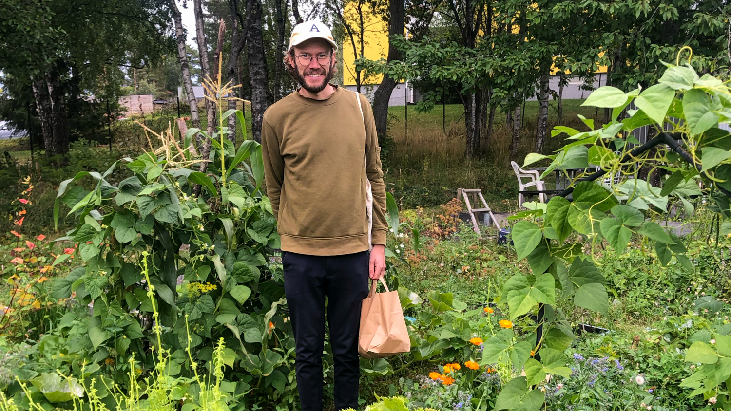 A man in a garden. Photo.