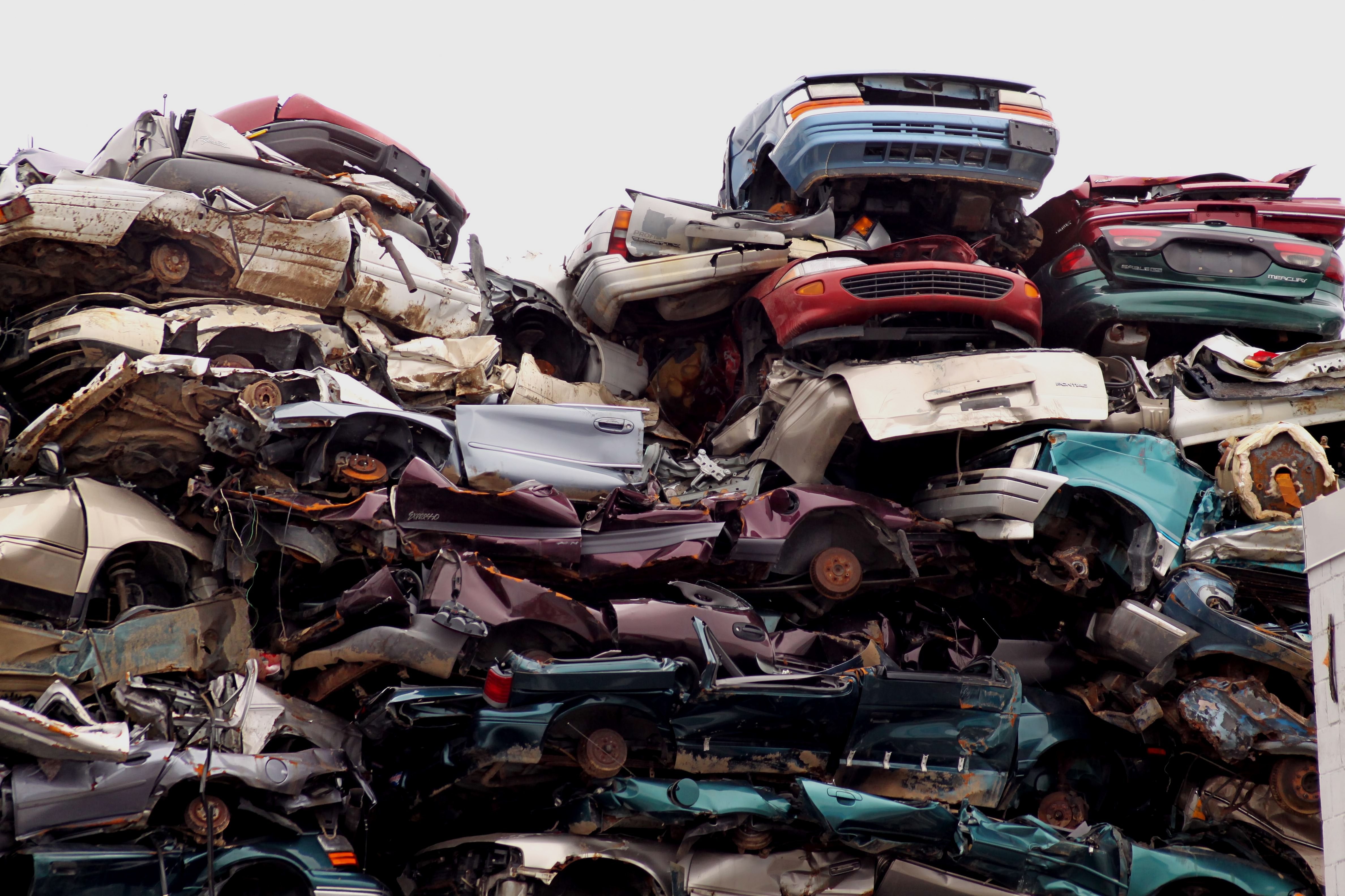 Piled up junk cars. Photo.