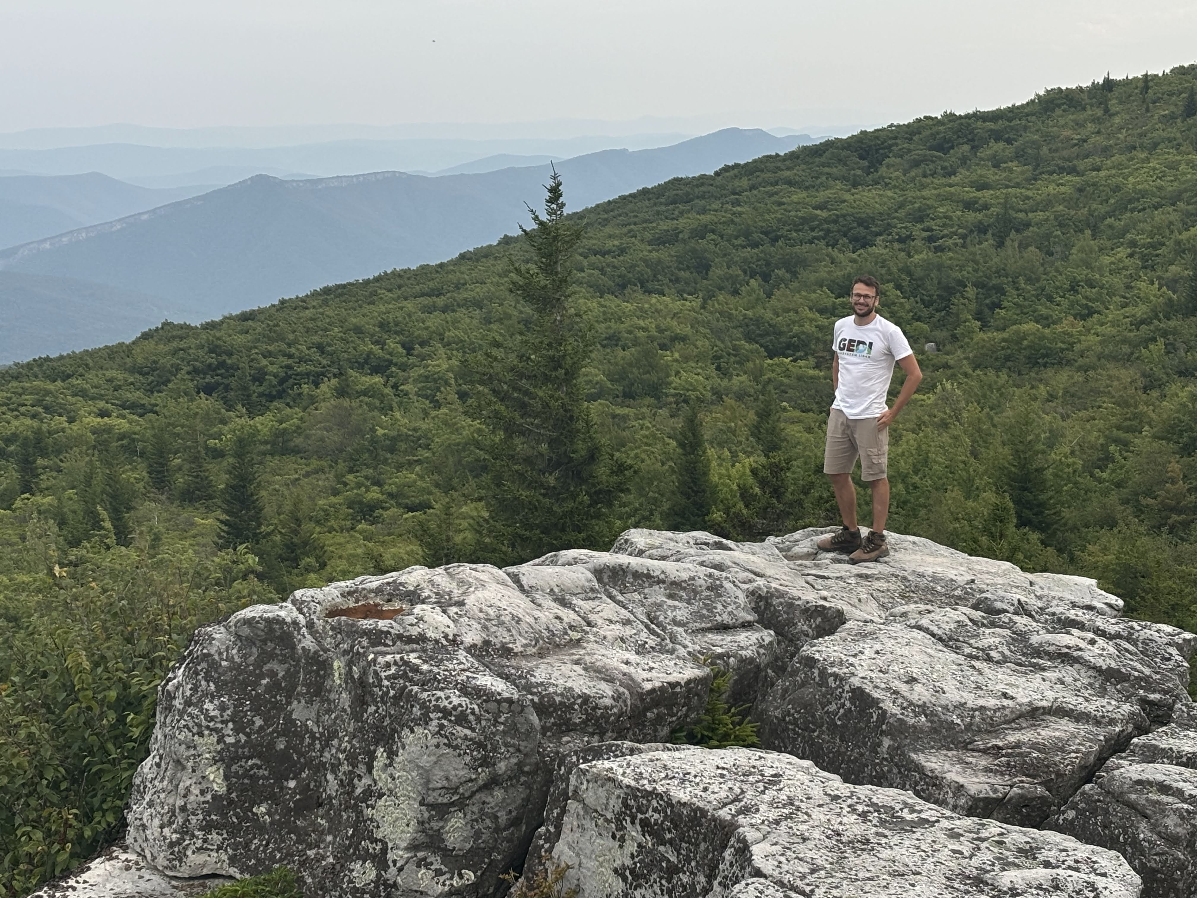 man standing on a mountain