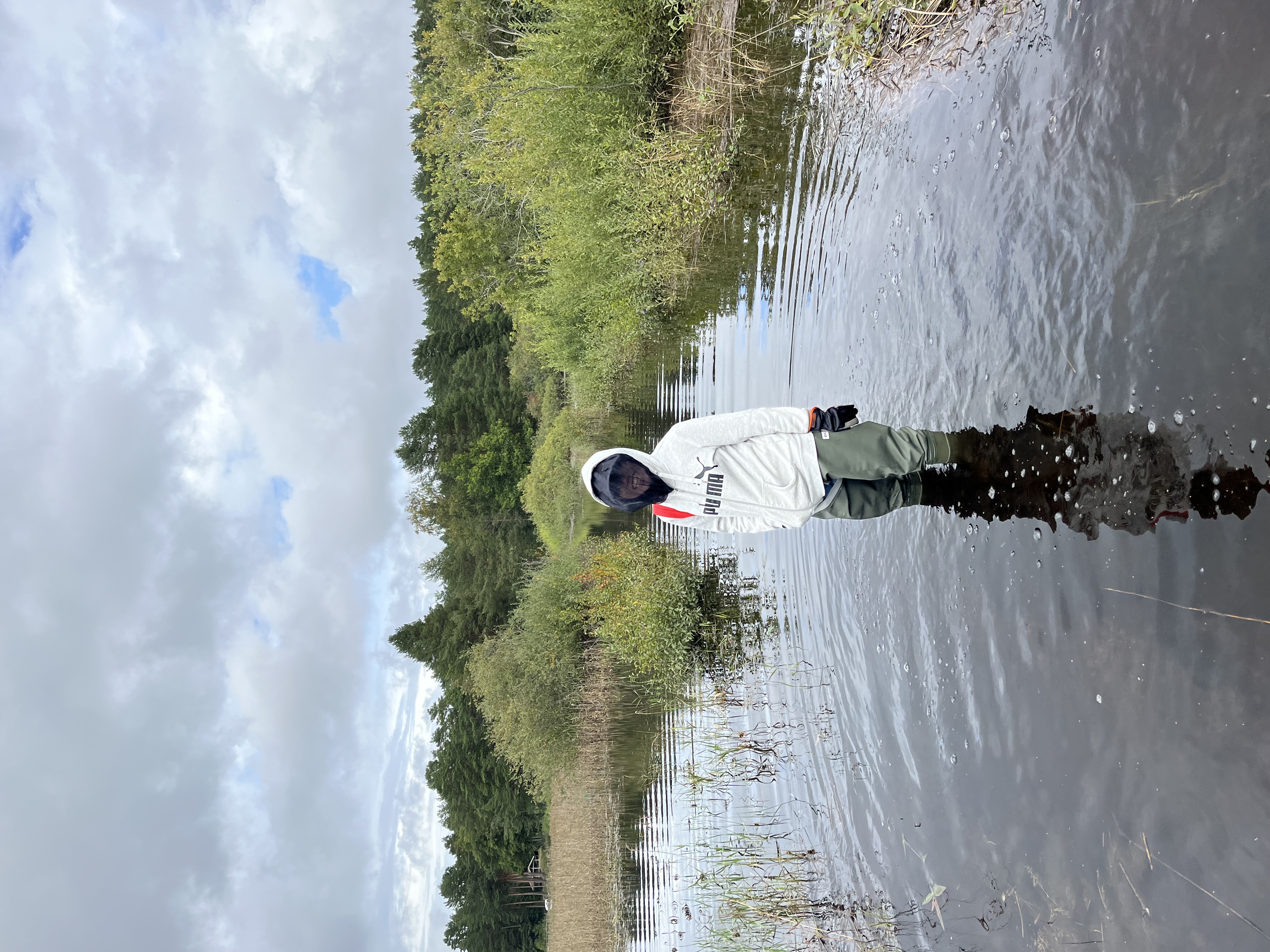 Woman standing in a lake