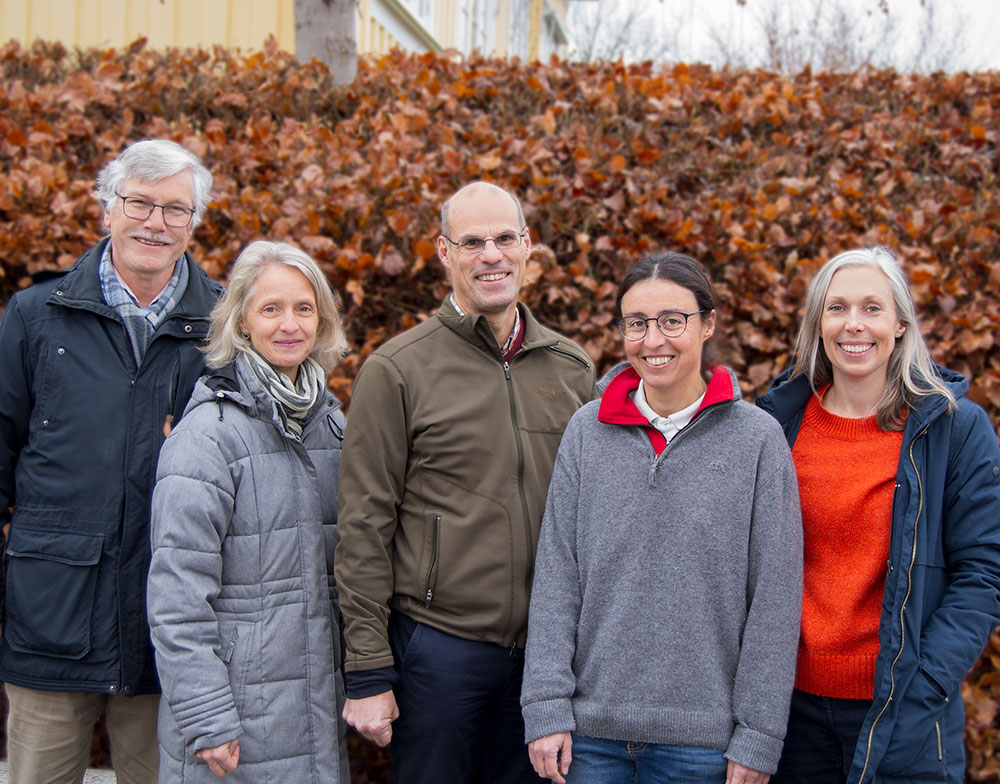 Group photo of the five researchers. 