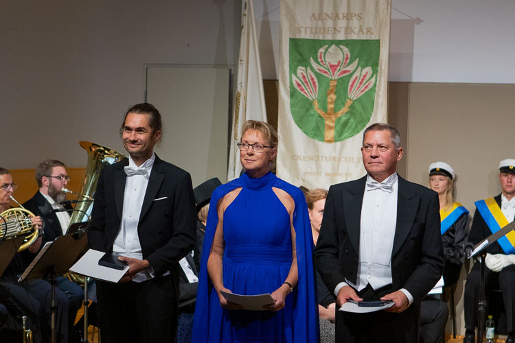 Picture of the receivers of the SLU medal of honor standing on stage looking proud. 