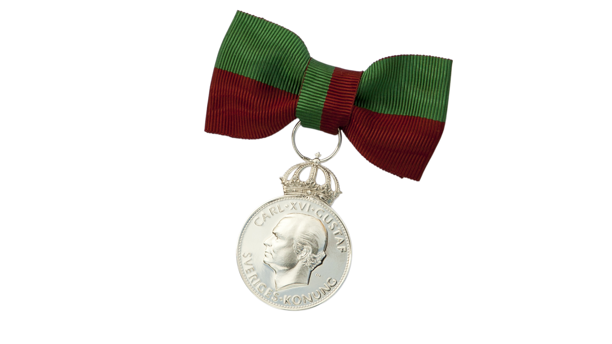 Gold medalj with a red and green ribbon.
